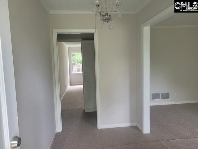 361 Wycombe St, Columbia, SC 29212 - hall featuring carpet flooring, baseboards, a chandelier, and ornamental molding