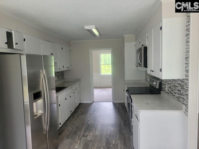 361 Wycombe St, Columbia, SC 29212 - kitchen featuring appliances with stainless steel finishes, a textured ceiling, decorative backsplash, dark wood finished floors, and light countertops
