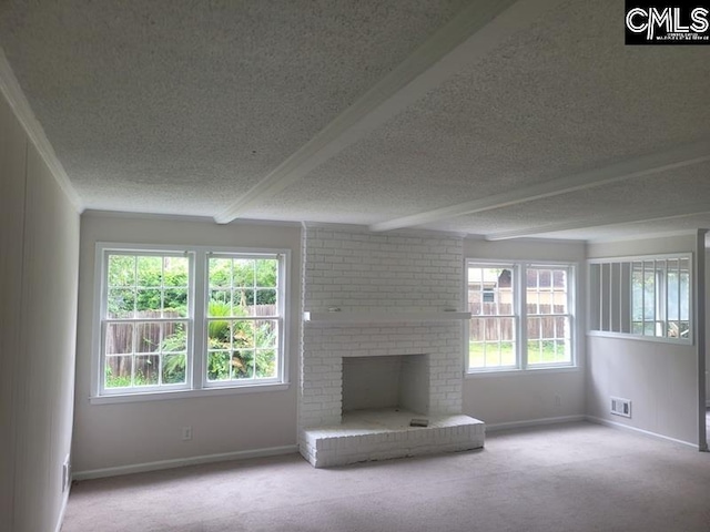 361 Wycombe St, Columbia, SC 29212 - unfurnished living room with a textured ceiling, carpet floors, baseboards, beam ceiling, and a brick fireplace