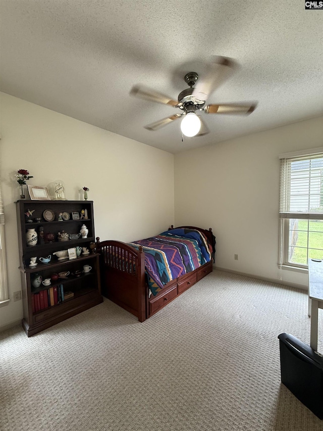 3270 Winchester Ln, Orangeburg, SC 29118 - bedroom with carpet, a textured ceiling, and a ceiling fan