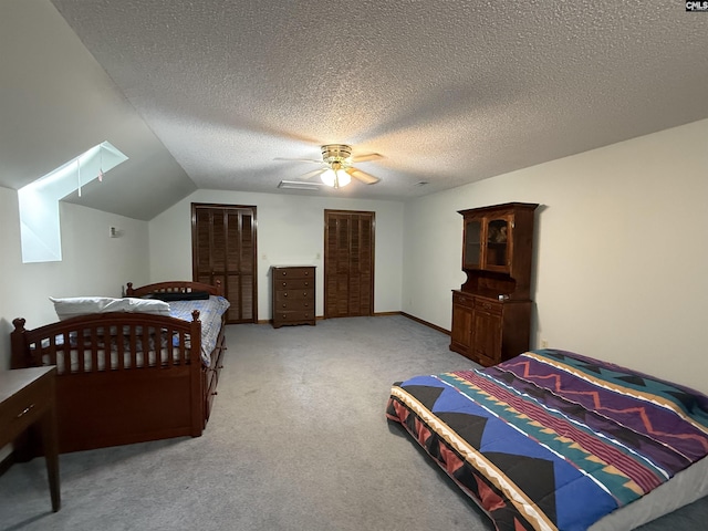 3270 Winchester Ln, Orangeburg, SC 29118 - bedroom with carpet flooring, a textured ceiling, a ceiling fan, and vaulted ceiling
