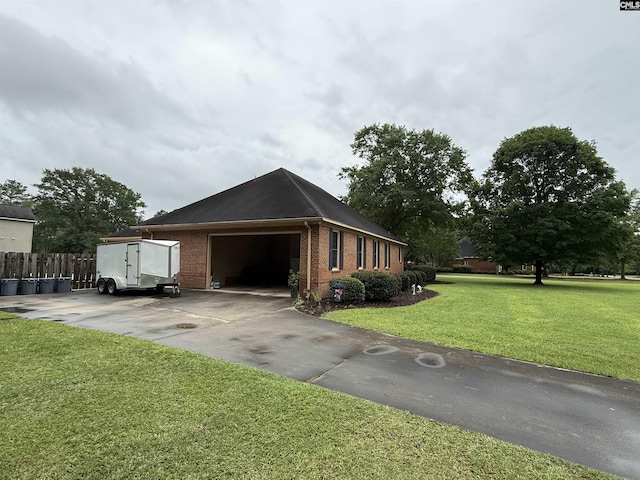 3270 Winchester Ln, Orangeburg, SC 29118 - view of property exterior with brick siding, an attached garage, and concrete driveway