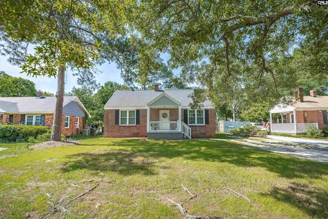 1321 C Ave, West Columbia, SC 29169 - view of front of property with brick siding and a front lawn