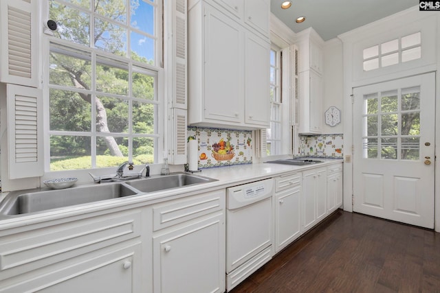 1100 W Carolina Ave, Hartsville, SC 29550 - kitchen featuring dishwasher, dark wood-type flooring, a sink, white cabinetry, and crown molding