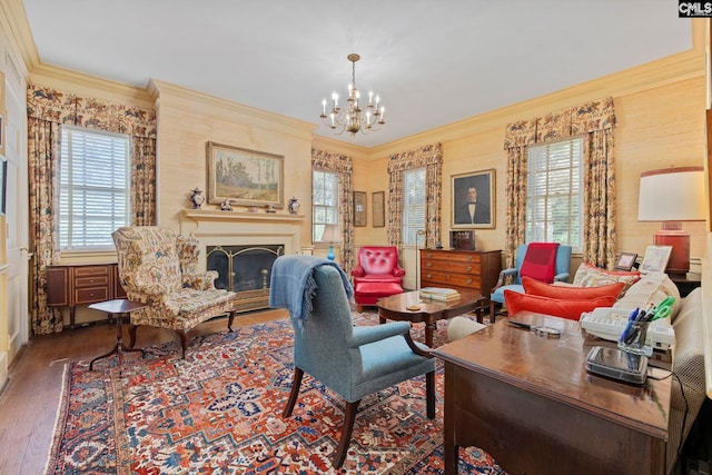 1100 W Carolina Ave, Hartsville, SC 29550 - living area with plenty of natural light, a chandelier, wood finished floors, ornamental molding, and a fireplace