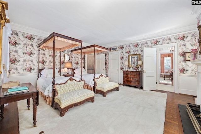 1100 W Carolina Ave, Hartsville, SC 29550 - bedroom with wallpapered walls, ornamental molding, wood finished floors, and wainscoting