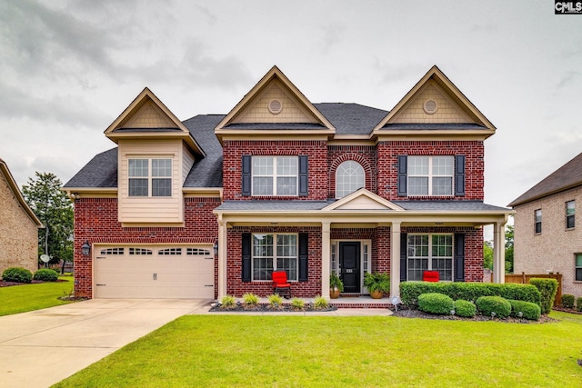 535 New Cut Ln, Blythewood, SC 29016 - view of front of house with brick siding, a front yard, a garage, and driveway