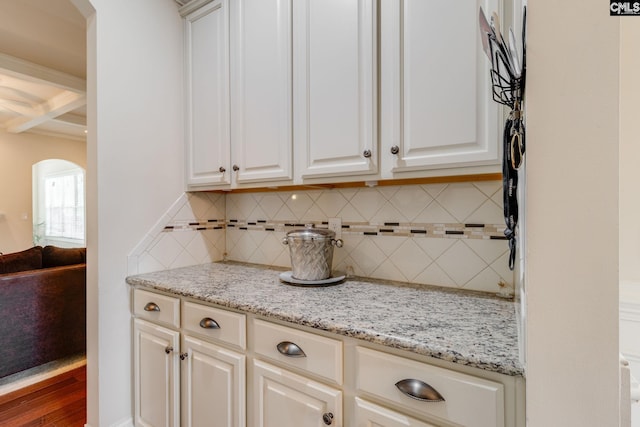 535 New Cut Ln, Blythewood, SC 29016 - bar area featuring arched walkways, tasteful backsplash, beamed ceiling, and coffered ceiling