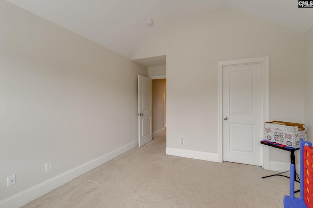 535 New Cut Ln, Blythewood, SC 29016 - unfurnished bedroom featuring carpet, baseboards, and lofted ceiling
