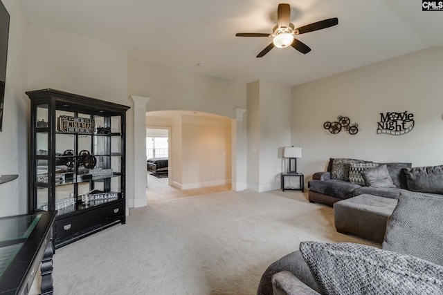535 New Cut Ln, Blythewood, SC 29016 - carpeted living area with decorative columns, a ceiling fan, arched walkways, baseboards, and vaulted ceiling