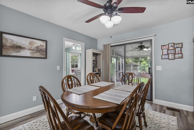421 Willow Bend Dr, Columbia, SC 29212 - dining area featuring a ceiling fan, baseboards, a textured ceiling, and wood finished floors