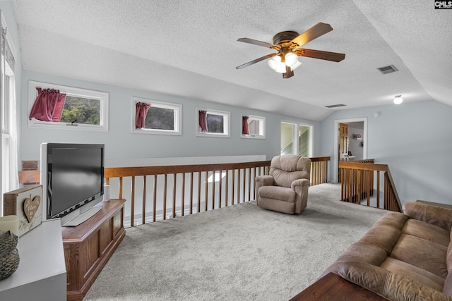 421 Willow Bend Dr, Columbia, SC 29212 - living area with lofted ceiling, a ceiling fan, a textured ceiling, carpet floors, and healthy amount of natural light