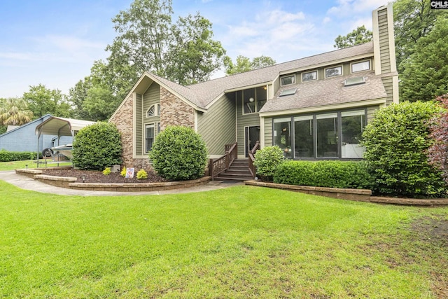 421 Willow Bend Dr, Columbia, SC 29212 - mid-century modern home with a detached carport, a chimney, a front yard, and roof with shingles