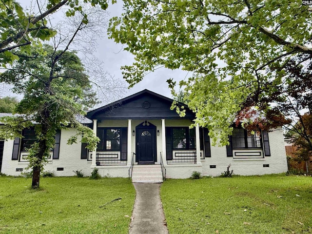 104 Farmington Rd, Columbia, SC 29223 - view of front of home with crawl space, a front lawn, brick siding, and a porch