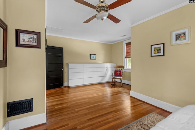 107 Southwood, Columbia, SC 29205 - bedroom with wood finished floors, crown molding, and a ceiling fan