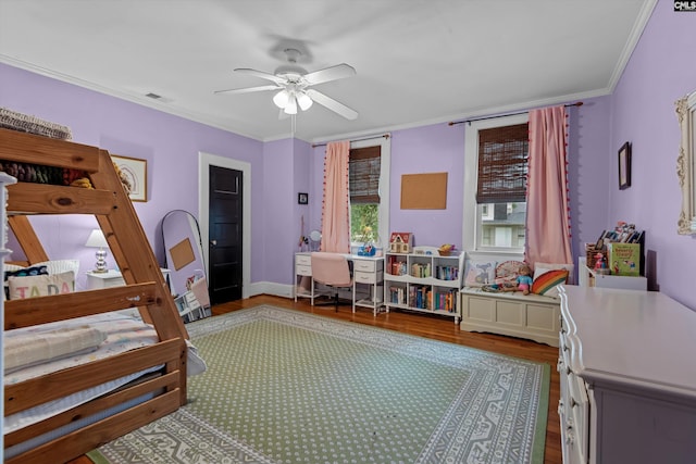 107 Southwood, Columbia, SC 29205 - bedroom with ornamental molding, wood finished floors, and a ceiling fan