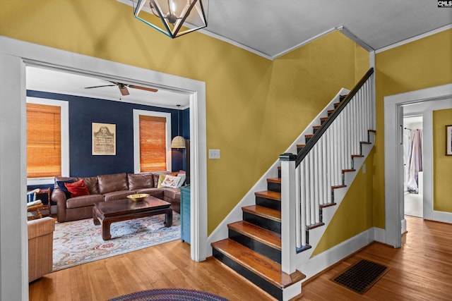 107 Southwood, Columbia, SC 29205 - staircase with wood finished floors, ornamental molding, and ceiling fan
