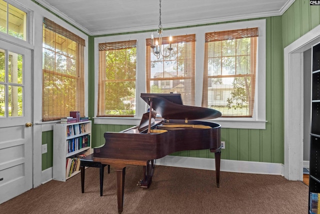 107 Southwood, Columbia, SC 29205 - living area featuring carpet floors, a chandelier, and ornamental molding