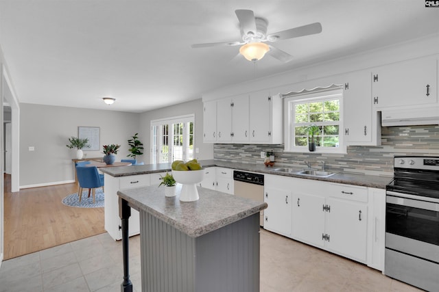 344 Rawls Dr, Leesville, SC 29070 - kitchen with stainless steel electric range oven, range hood, dishwasher, a peninsula, and healthy amount of natural light