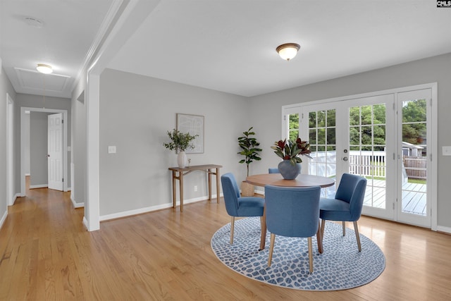 344 Rawls Dr, Leesville, SC 29070 - dining area with attic access, light wood-style floors, and french doors