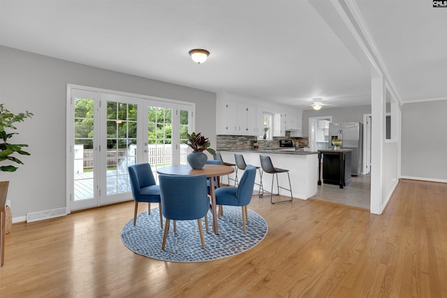 344 Rawls Dr, Leesville, SC 29070 - dining space with french doors, light wood-type flooring, and ceiling fan