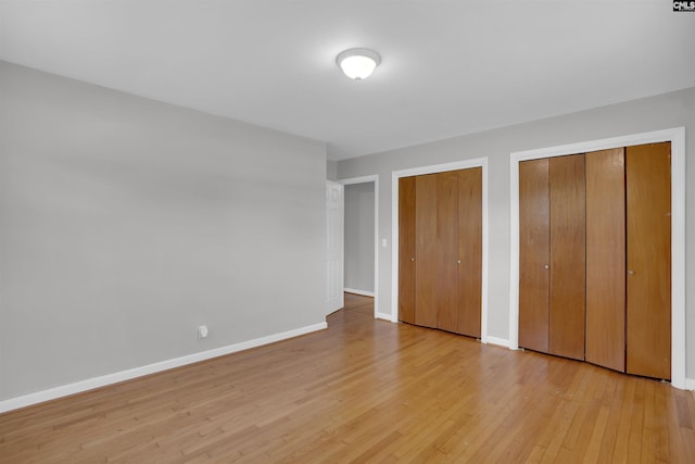 344 Rawls Dr, Leesville, SC 29070 - unfurnished bedroom with two closets and light wood-style floors