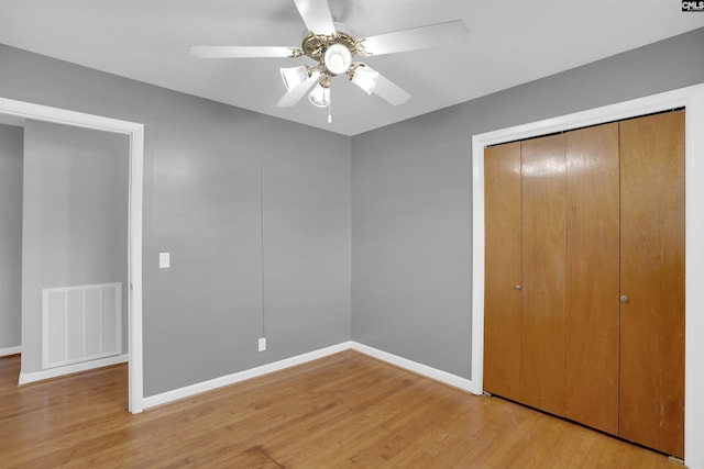344 Rawls Dr, Leesville, SC 29070 - unfurnished bedroom with light wood-style floors, a closet, and ceiling fan
