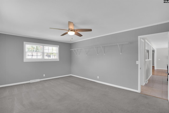 344 Rawls Dr, Leesville, SC 29070 - carpeted spare room with ceiling fan and crown molding