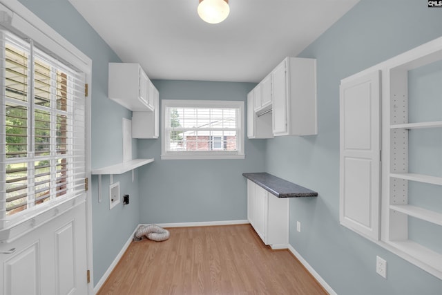 344 Rawls Dr, Leesville, SC 29070 - washroom featuring cabinet space, hookup for an electric dryer, and light wood finished floors
