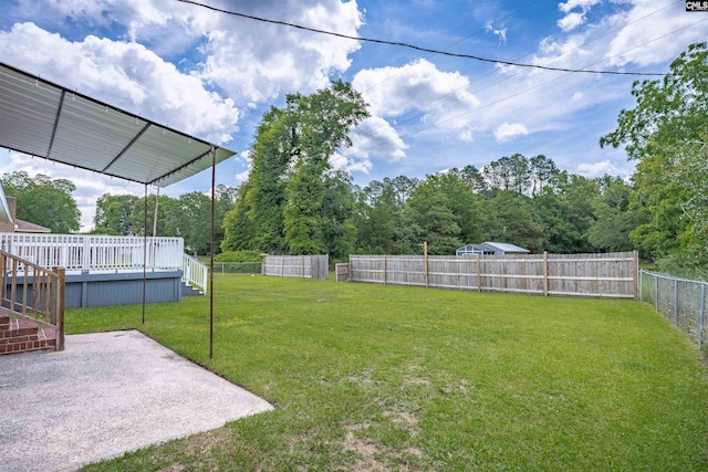 344 Rawls Dr, Leesville, SC 29070 - fenced backyard featuring a patio, a deck, and stairs