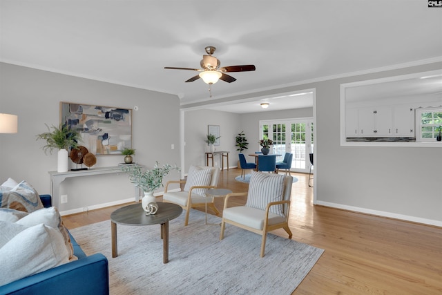 344 Rawls Dr, Leesville, SC 29070 - living area featuring a ceiling fan, crown molding, and light wood-type flooring