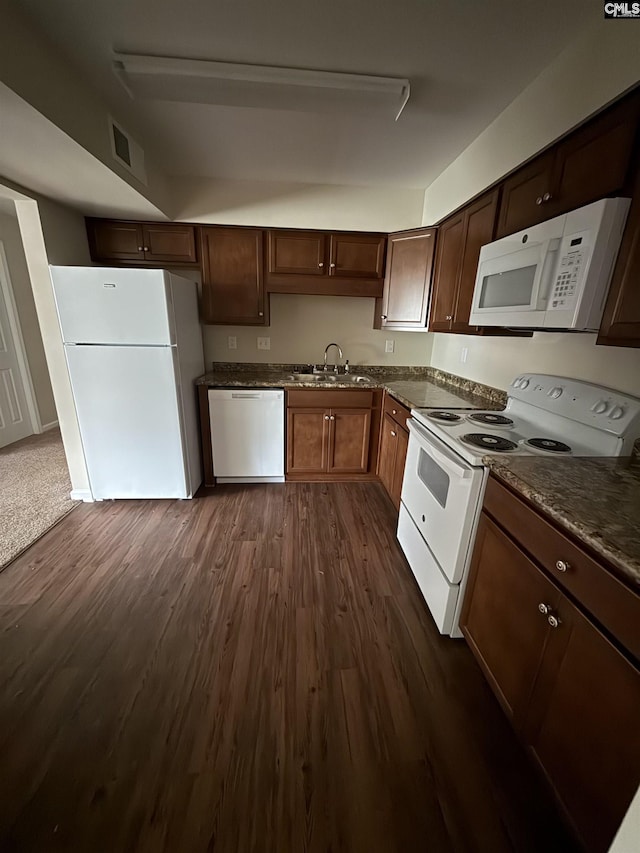 1101 Menlo Dr, Columbia, SC 29210 - kitchen with white appliances, dark wood-style floors, and dark brown cabinetry