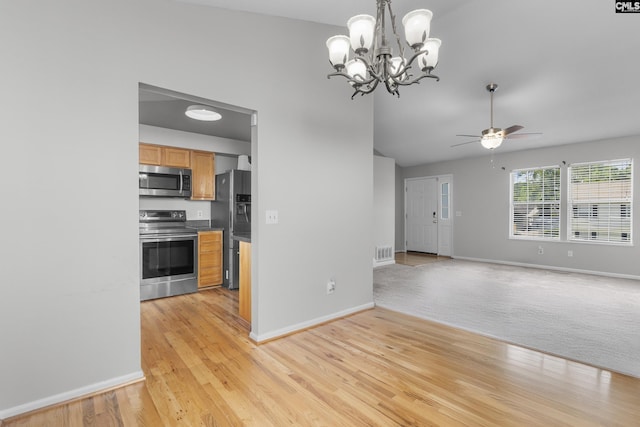 309 Pebble Creek Ct, West Columbia, SC 29170 - kitchen with stainless steel appliances, ceiling fan, a chandelier, open floor plan, and dark countertops