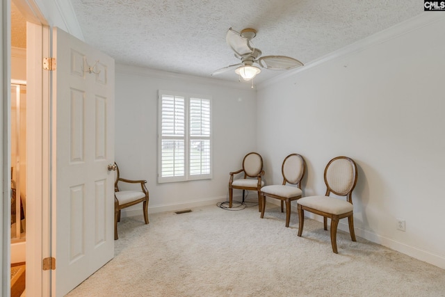 2117 Togetherness Way, Mcbee, SC 29101 - living area featuring carpet flooring, ceiling fan, crown molding, and a textured ceiling