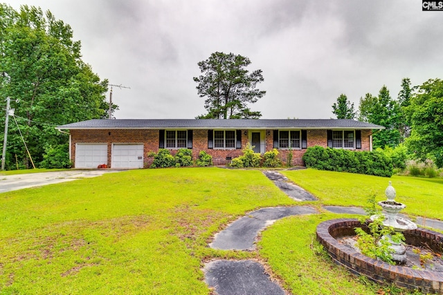 2117 Togetherness Way, Mcbee, SC 29101 - ranch-style home with a front lawn, brick siding, concrete driveway, and an attached garage