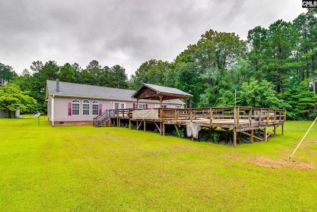 2117 Togetherness Way, Mcbee, SC 29101 - back of house featuring a lawn, crawl space, a wooden deck, and a gazebo