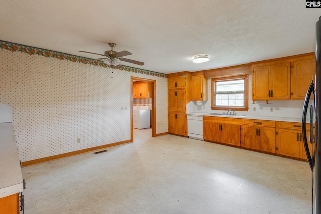 2117 Togetherness Way, Mcbee, SC 29101 - kitchen featuring dishwasher, washer / dryer, light countertops, wallpapered walls, and a ceiling fan