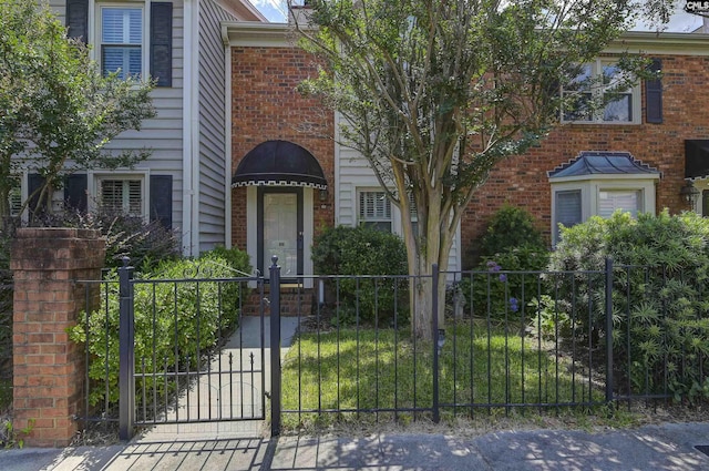 152 Carlyle Cir, Columbia, SC 29206 - view of front of property with brick siding and a gate