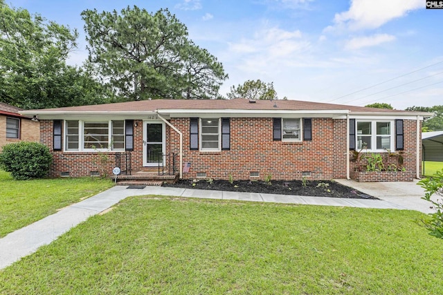 1409 Hazel St, Cayce, SC 29033 - single story home featuring crawl space, a front yard, and brick siding