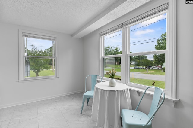 1409 Hazel St, Cayce, SC 29033 - dining space with a textured ceiling and light marble finish floors