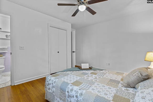 1409 Hazel St, Cayce, SC 29033 - bedroom with wood finished floors, a closet, ceiling fan, and ensuite bathroom