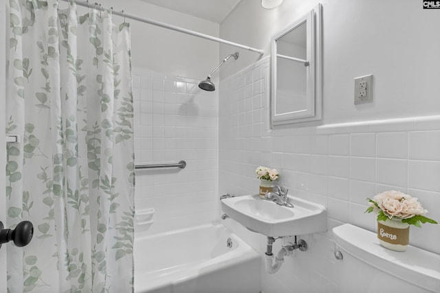1409 Hazel St, Cayce, SC 29033 - bathroom featuring shower / bath combo, tile walls, and tasteful backsplash