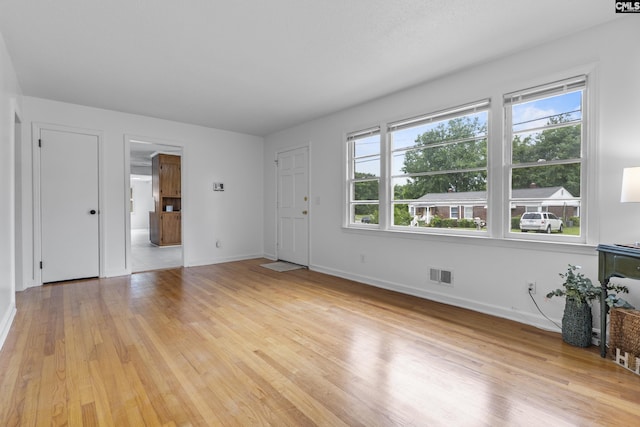 1409 Hazel St, Cayce, SC 29033 - foyer with healthy amount of natural light and light wood-style flooring
