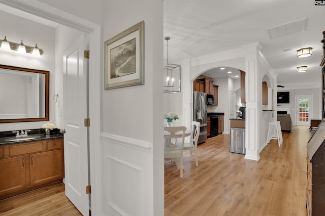 330 Lanyard Ln, Chapin, SC 29036 - hall with arched walkways and light wood-style floors