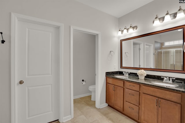 330 Lanyard Ln, Chapin, SC 29036 - full bathroom with double vanity, a shower stall, and tile patterned floors