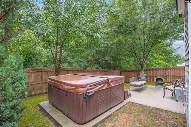330 Lanyard Ln, Chapin, SC 29036 - fenced backyard featuring a hot tub and a patio area