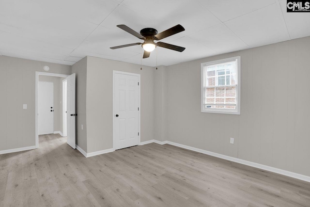 112 Woodcrest Dr, Columbia, SC 29203 - unfurnished bedroom featuring wood finished floors and a ceiling fan