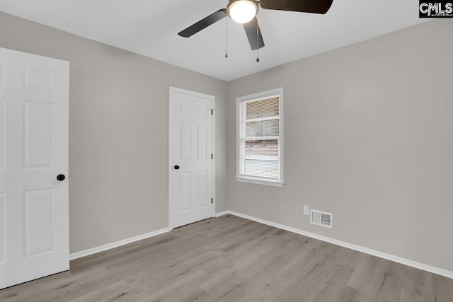 112 Woodcrest Dr, Columbia, SC 29203 - unfurnished bedroom with wood finished floors and a ceiling fan