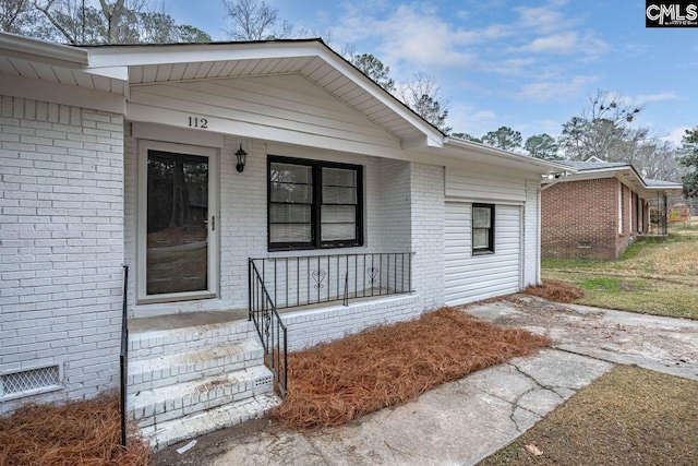 112 Woodcrest Dr, Columbia, SC 29203 - doorway to property featuring brick siding and covered porch