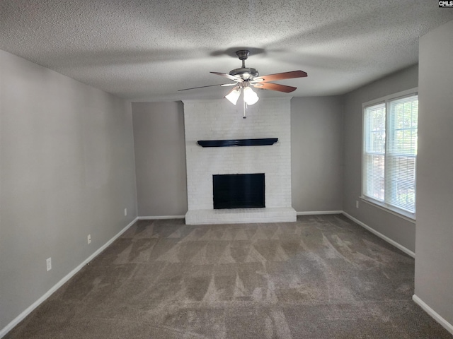 325 Trinity Three Rd, Irmo, SC 29063 - unfurnished living room with carpet, a ceiling fan, a fireplace, and a textured ceiling
